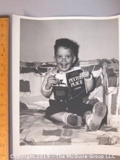 Large Format B + W Photo of Toddler reading Peyton Place Book 