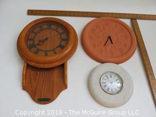 (3) battery operated wall clocks