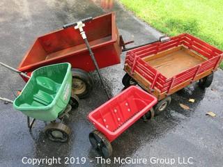 Collection including wooden red Wagon, tractor pulled metal dump wagon and (2) fertilizer spreaders