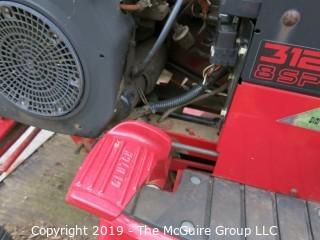 Toro Wheelhorse Lawn Tractor; 1000 hours; Model 78345; SN 8901393; Kohler Command 12.5 Pro Series 8-Speed; fitted with 42" side discharge Toro mowerdeck, Model 74328, SN 8900544; needs battery, key and tune-up according to consignor (NOTE: Description altered 9/7/5:36am) 