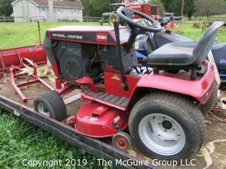 Toro Wheelhorse Lawn Tractor; 1000 hours; Model 78345; SN 8901393; Kohler Command 12.5 Pro Series 8-Speed; fitted with 42" side discharge Toro mowerdeck, Model 74328, SN 8900544; needs battery, key and tune-up according to consignor (NOTE: Description altered 9/7/5:36am) 