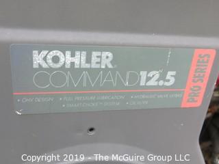 Toro Wheelhorse Lawn Tractor; 1000 hours; Model 78345; SN 8901393; Kohler Command 12.5 Pro Series 8-Speed; fitted with 42" side discharge Toro mowerdeck, Model 74328, SN 8900544; needs battery, key and tune-up according to consignor (NOTE: Description altered 9/7/5:36am) 