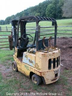 Yale Forklift; 3000 lb. capacity; 5231 hours; needs battery, tune up and propane tank, according to consignor