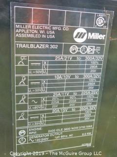 (2) Miller Trailblazer Welders on wooden pallets. Each has a sticker saying "Non-repairable".  Buying for parts only.  (Note: Description altered 09.04 @ 6:50pm) 
