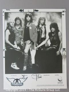 Collection of Large Format B + W Publicity Photos by numerous banks including The Motley Crew, The Byrds, AC/DC, Motorhead, Aerosmith, B-52/s, Steve Miller, and James Doohan.  