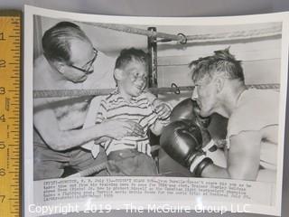 Collection of large format B&W photos including boxers Dick Tiger, Archie Moore, Yvon Durelle, Primo Carnara and Gene Fullmer.  