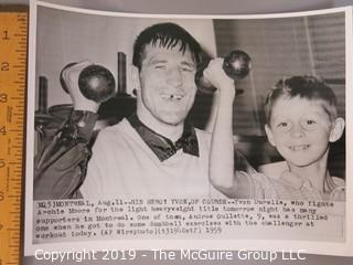 Collection of large format B&W photos including boxers Dick Tiger, Archie Moore, Yvon Durelle, Primo Carnara and Gene Fullmer.  