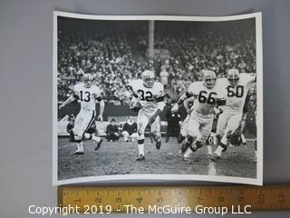 8 x 10" B&W photo of #32 Jim Brown, running back for the Cleveland Browns, in game action; taken by Robert J. Quinlan (#13 is Frank Ryan)