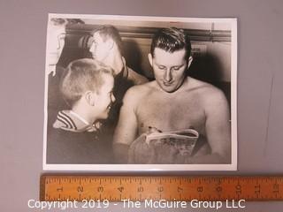 8 x 10" B&W photo of Pee Wee Reese, Yankee, signing autograph for fan in 1957, taken by Paul Siesel