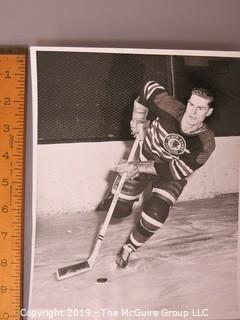 Collection of large format B&W sports photographs including the pitcher Dennis Reeder of the Minneapolis Millers, golfers Tom Gorman and Ben Hogan, and a toboggan sled race circa 1938, and hockey player Allen Stanley ,  