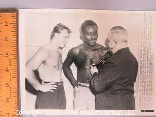 Collection of large format B&W boxing photos including Ezzard Charles, Feddie Peshore