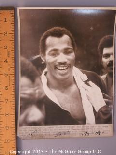 Collection of large format B&W boxing photos including Ken Norton