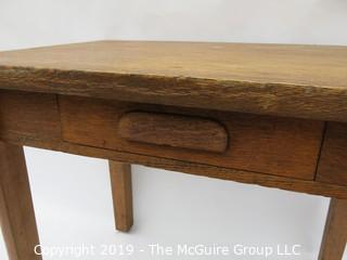 Oak veneered desk with single drawer. Mfg in Williamsport, PA