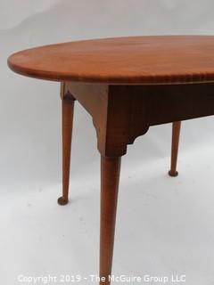 VERY NICE Oval Top Tiger Maple Occasional Table with Slightly Splayed Turned Legs and Pad Feet.  Top is 33 x 24"; base is 24W x 21D"