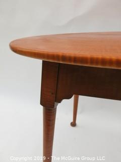 VERY NICE Oval Top Tiger Maple Occasional Table with Slightly Splayed Turned Legs and Pad Feet.  Top is 33 x 24"; base is 24W x 21D"