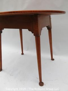 VERY NICE Oval Top Tiger Maple Occasional Table with Slightly Splayed Turned Legs and Pad Feet.  Top is 33 x 24"; base is 24W x 21D"