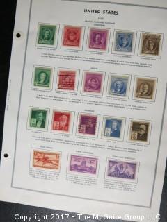 Collection of unsorted postage stamps