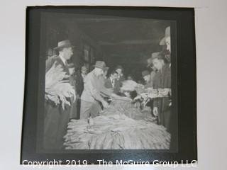 (4) Photos of tobacco auction