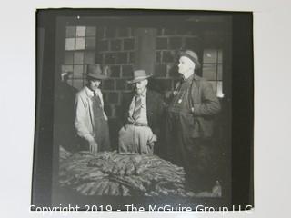 (4) Photos of tobacco auction