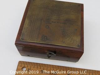 Marine Master Box containing brass compass. brass telescope, brass scale with chart, brass spirit level, brass alidade with coloured glass and brass boat clinometer.  