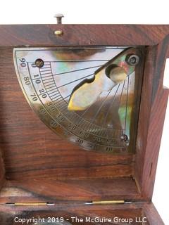 Marine Master Box containing brass compass. brass telescope, brass scale with chart, brass spirit level, brass alidade with coloured glass and brass boat clinometer.  