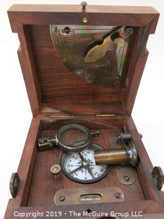 Marine Master Box containing brass compass. brass telescope, brass scale with chart, brass spirit level, brass alidade with coloured glass and brass boat clinometer.  