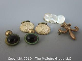 Collection of costume jewelry including fleur de lis pin