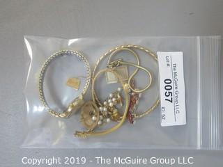 Collection of Jewelry including ladies watch, Monet tagged bangle bracelet. 