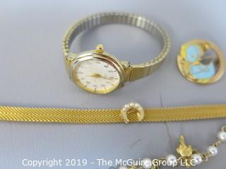 Collection of Jewelry including ladies watch, Monet tagged bangle bracelet. 