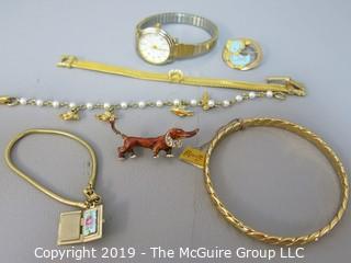 Collection of Jewelry including ladies watch, Monet tagged bangle bracelet. 