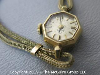 Omega 17 Jewel ladies watch with 14k gold case; band broken