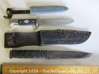 (2) hunting knives with sheaths; 1 marked "Anton Wingen, Solingen, Germany"