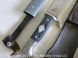 (2) hunting knives with sheaths; 1 marked "Anton Wingen, Solingen, Germany"