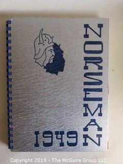 Collection of books including a pictorial review of the Civilian Conservation Corp in Kansas and Emporia College Yearbooks