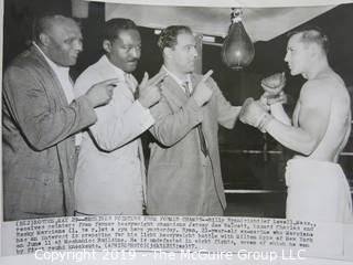 Photo: Sports: Boxing: 1953 AP and ringside photos of Jersey Joe Walcott and Rocky Marciano. Incl. ticket stub from April 10, 1953 bout.