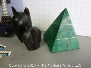 Collection including carved elephants, stone pyramid, bead works and metal mask