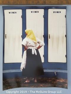 Photo: uncredited: Historical; Americana: woman waiting to use restrooms