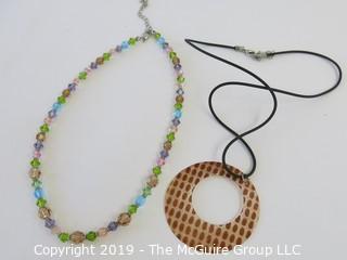 Jewelry: 2 necklaces - shell and plastic crystal beads