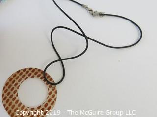 Jewelry: 2 necklaces - shell and plastic crystal beads