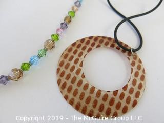 Jewelry: 2 necklaces - shell and plastic crystal beads