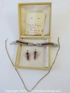 Jewelry: Quality faux ruby and rhinestone bracelet and earring set with necklace. Similar to the HEART brooch. Could not find any markings.